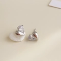 Detailed view of silver asymmetric pear-cut zircon and teardrop metal stud earrings - Rhodium Plated Silver Heart Zirconia Studs