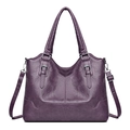 Purple faux leather tote bag with lychee texture and silver metal buckles in a variant view - 9001 Purple