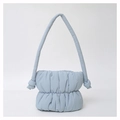 Detail of light blue puffy nylon bag showing quilted texture and soft knotted shoulder strap - Sky Blue