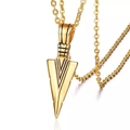 Detailed view of a gold-colored arrow pendant necklace with a polished metal finish - Gold Arrow + 60cm Chain