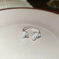 Detail of elegant open ring with white pearls and zircons on a beige ceramic plate - 7# Starry Cluster Style (Silver)