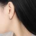 Sleek silver twisted spiral hoop earrings in stainless steel for a minimalist look - Steel Color