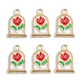 Detailed view of red rose alloy pendants with gold bezels for DIY jewelry making - Rose in Glass Dome Style