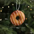 Christmas donut ornament with white icing and glitter for festive tree decoration - Donut