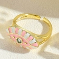 Adjustable golden evil eye ring with pink and white enamel and teal gemstone inlay - Pink