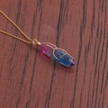 Detail of a wire-wrapped hexagonal crystal pillar necklace with pink to blue gradient colors - A-NSN0236 Gold Copper O-Chain