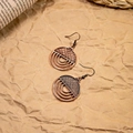 Detailed close-up of bohemian bronze geometric hoop earrings with hollow texture - Antique Bronze Semi-Circle Grid
