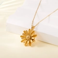 Golden stainless steel sun flower pendant necklace displayed on a white block - 137512-Gold Sunflower