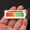 My Social Battery enamel pin in white and gold with a sliding energy level indicator - Social Battery Sport White