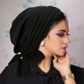 Detail view of black velvet headscarf showing side drapes and professional tie design - Black