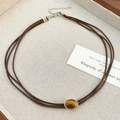Tiger eye necklace with brown cords and oval amber stone in silver setting - Silver Amber Gemstone Cord Necklace Style (WG-1194)