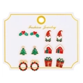 Detailed set of 6 pairs of festive Christmas stud earrings on a fashion jewelry display card - Gnome and Snow House Style (6843)