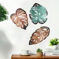 Three-piece metal palm leaf wall decor set in vintage bronze finish on white wall - KY2065/3Pcs Set/Bronze Green