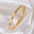 Elegant gold titanium steel bangle featuring minimalist star motifs and white rhinestones - Gold Eight-pointed Star