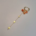 Bohemian gold stainless steel earring with orange natural stone and dangling hearts - Red Aventurine