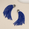 Detail of blue beaded tassel earrings featuring silver caps inlaid with crystals - Dark Blue
