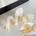 Elegant cream pearl wavy acetate hair claw clip with a glossy marble texture finish - Transparent Orange Floral Wrapped Clip
