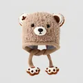 Detail of plush bear hat showing soft faux fur texture and knitted earflap ties - 3-8 Years Old / Khaki