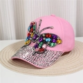 Detailed close-up of a pink denim baseball cap with a large colorful rhinestone butterfly - Style 33-Pink Colorful Rhinestone Large Butterfly