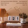 Golden iron heart-shaped LED perpetual calendar with a white wooden base and flip cards - Heart White Base Calendar