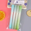 Set de cuatro rotuladores fluorescentes en tonos azules y verdes con diseño degradado - Batido de Frijol Mungo / 4 Unidades/Bolsa