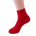 Plush red coral fleece slipper socks for women with a cozy and soft fuzzy texture - Red