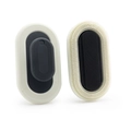 Dual-sided silicone facial cleansing brush in beige and black colors shown on white background - Black Brush + Cool Grey Base