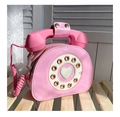 Detail view of pink vintage telephone bag with rotary dial and heart-shaped center - Pink