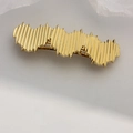 Elegant gold wavy hair clip with vertical pleated texture and metallic glossy finish - Gold Triple Heart Barrette