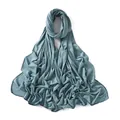 Detailed view of the turquoise modal jersey scarf showing high-quality overlock hem edges - Blue-Green (#48)