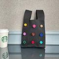 Black knit tote bag with nine colorful pompoms and integrated handle for daily commute - Rainbow Ball Black