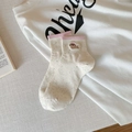 Calcetines beige de hilo jaspeado con puño rosa acanalado y bordado de perro - Talla única / Rosa