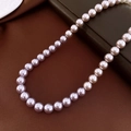 Close-up of pearl necklace featuring gradient shades from lavender to ivory on silk - 8mm / Purple