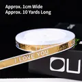 Golden silk ribbon with white I LOVE YOU print for gift wrapping and DIY crafts - Ribbon I LOVE YOU Gold 1cm Wide 10 Yards
