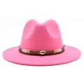 Detail of rose pink fedora hat featuring a brown leather band and seashell ornament - Rose Red
