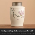 Hand-painted magnolia ceramic tea canister with grey metal lid and 620ml capacity - Straw Ash Hand Painted Magnolia - Impression Jar