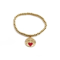 Goldenes Perlenarmband mit rotem Emaille-Herzanhänger, Kreuz und Zirkonia-Verzierung - Herz-Kreuz-Anhänger-Stil / Gold/Rot