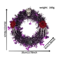 Vista detallada de corona de Halloween de 35 cm con alambre púrpura, calaveras y rosas - Púrpura Una Cabeza Dos Manos