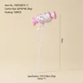 Pink and white candy cane ornament with colorful glitter and a matching pink ribbon bow - #11 Candy Stake