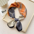 Elegant orange and grey square silk scarf with horse bit pattern in a golden frame - Belt Buckle Orange Grey