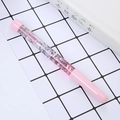Creative pink liquid glitter pen with '100% Girl' text for students and office - Quicksand Pen With Text Pink