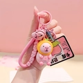 Pink Capybara keychain featuring a lemon hat and matching pink wristlet strap - Orange Pink Capybara PVC