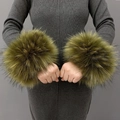Detail of soft faux fur wrist cuffs in dark green finish on a model's wrist - Army Green Jacquard