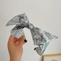 Fashionable light blue fabric headband with abstract print and large bow design - Light Blue Cartoon Print Bow Headband