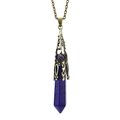 Macro shot of Lapis Lazuli hexagonal crystal pendant with bronze vintage metal cap - Antique Bronze + Lapis Lazuli