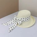 Detail of a beige woven straw hat with a black polka dot bow ribbon for beach vacation - M (56-58cm) / Milky White