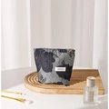 Gray linen makeup bag with black floral embroidery and brand label on a wooden tray - 17cmx14cm / Dark Blue Small
