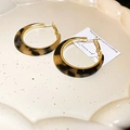 Vintage tortoiseshell resin hoop earrings with gold trim on a ceramic plate - 8# Silver Needle Round Resin Leopard Hoop