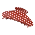 Dettaglio di una grande pinza per capelli marrone rossastro a pois bianchi in stile chic - Rosso