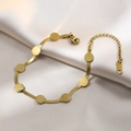 Goldenes Titanstahl-Schlangenarmband mit eleganten flachen runden Scheibenanhängern - Rundes Scheibenarmband / Gold